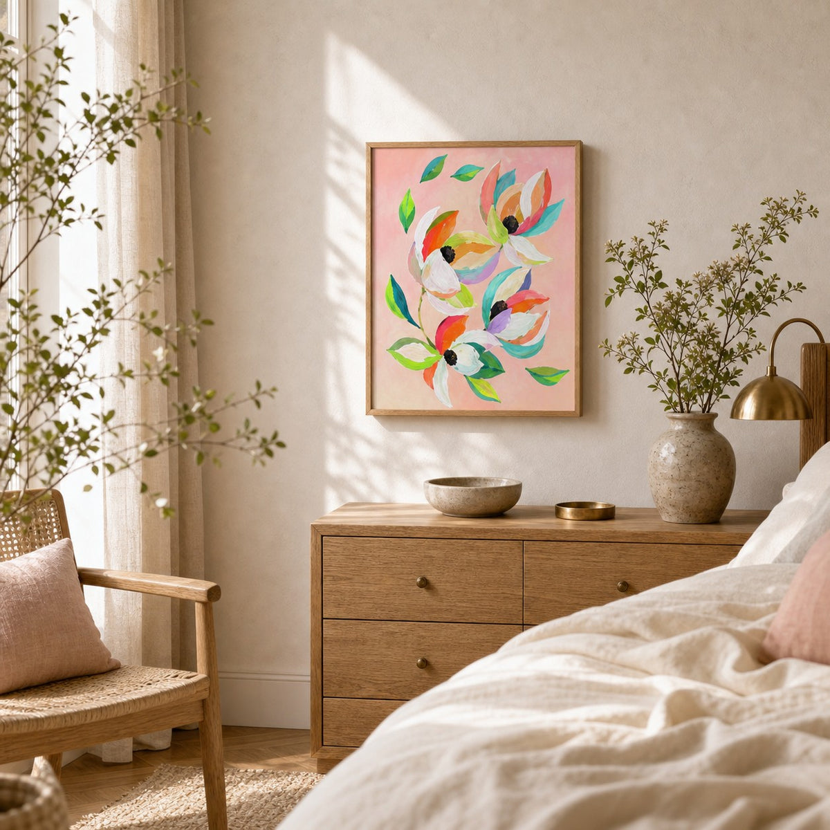Magnolia Pink by Amber Miro, original painting of pink magnolia blooms, hanging above a bedroom dresser, wide view