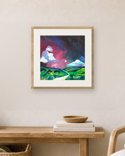 Aurora Borealis by Amber Miro, fine art print shown in a natural oak frame with a white mat (frame not included)