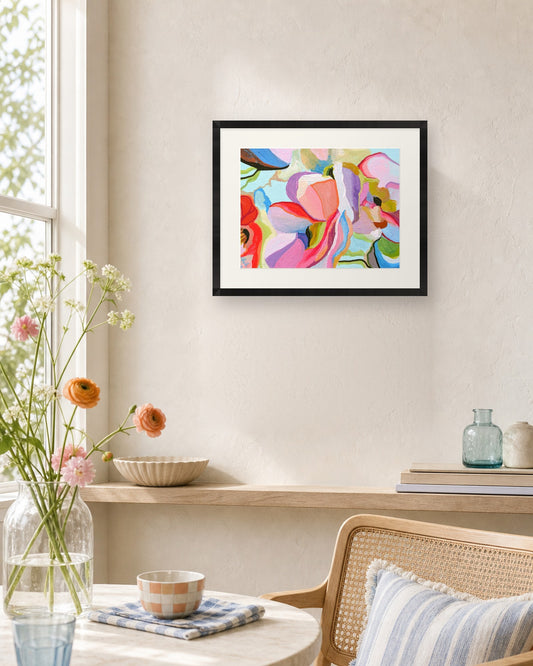 Petals in Motion by Amber Miro, fine art print shown in a black frame with a white mat (frame not included)