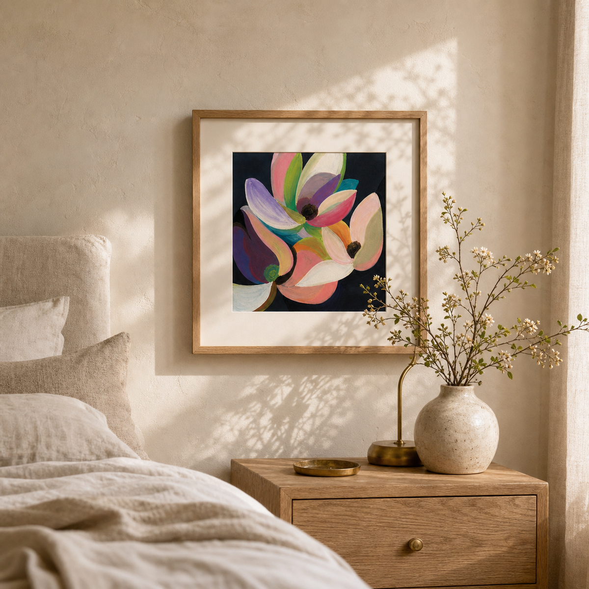 Dark Floral by Amber Miro, original moody floral in green, brown, and pink, matted in oak above a bedroom nightstand