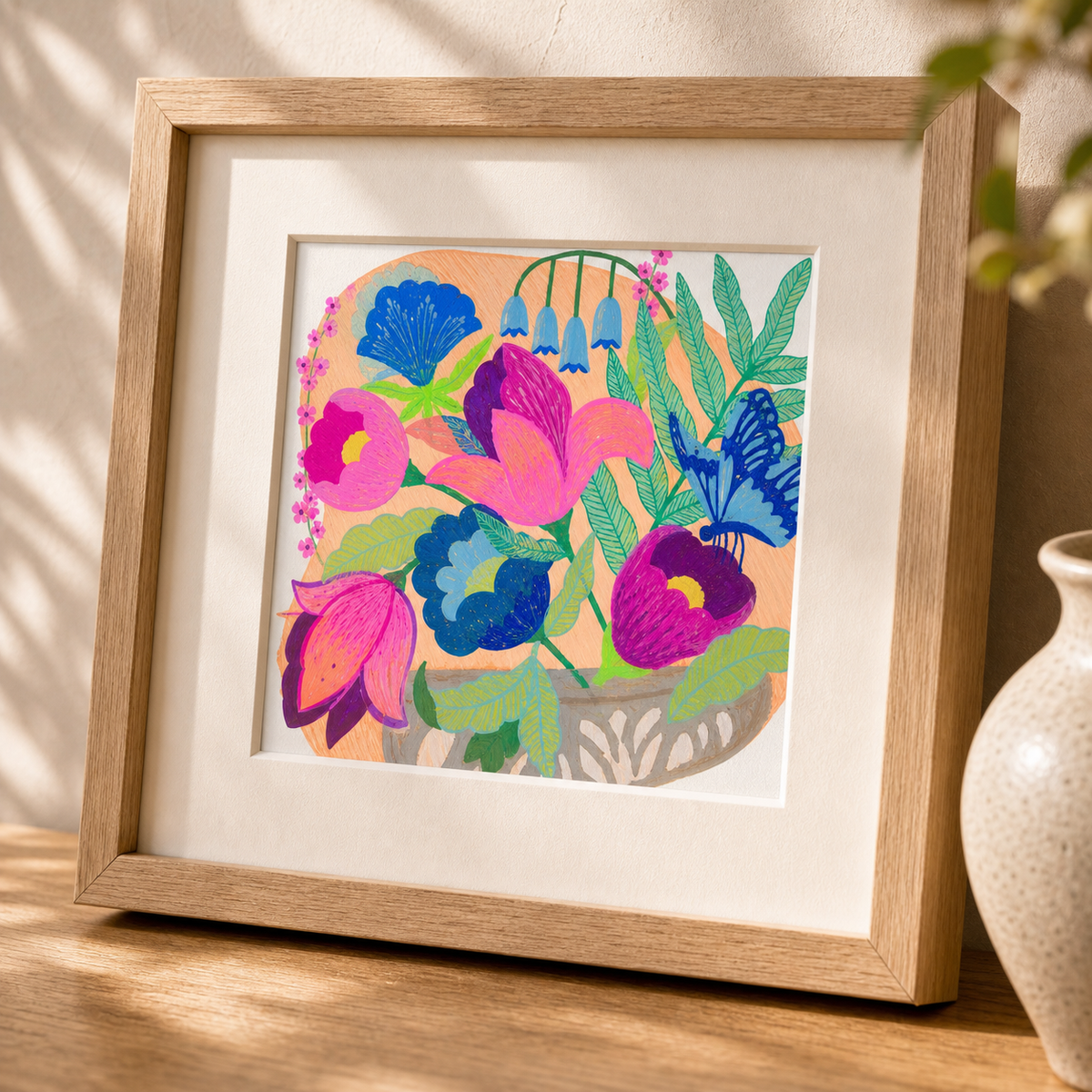 Flowers and Butterfly by Amber Miro, original painting of flowers and a butterfly, angled close-up in an oak frame