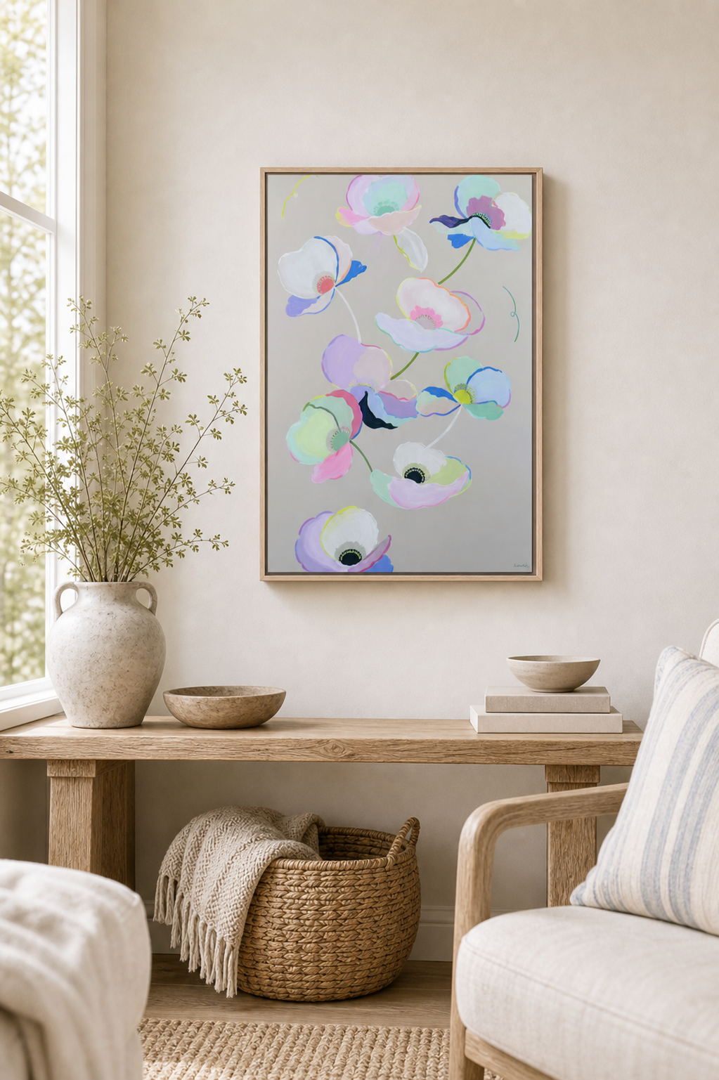 Subtle Poppy Fall by Amber Miro, original poppy painting in pale pink and grey, in a slim wood frame above a wooden console