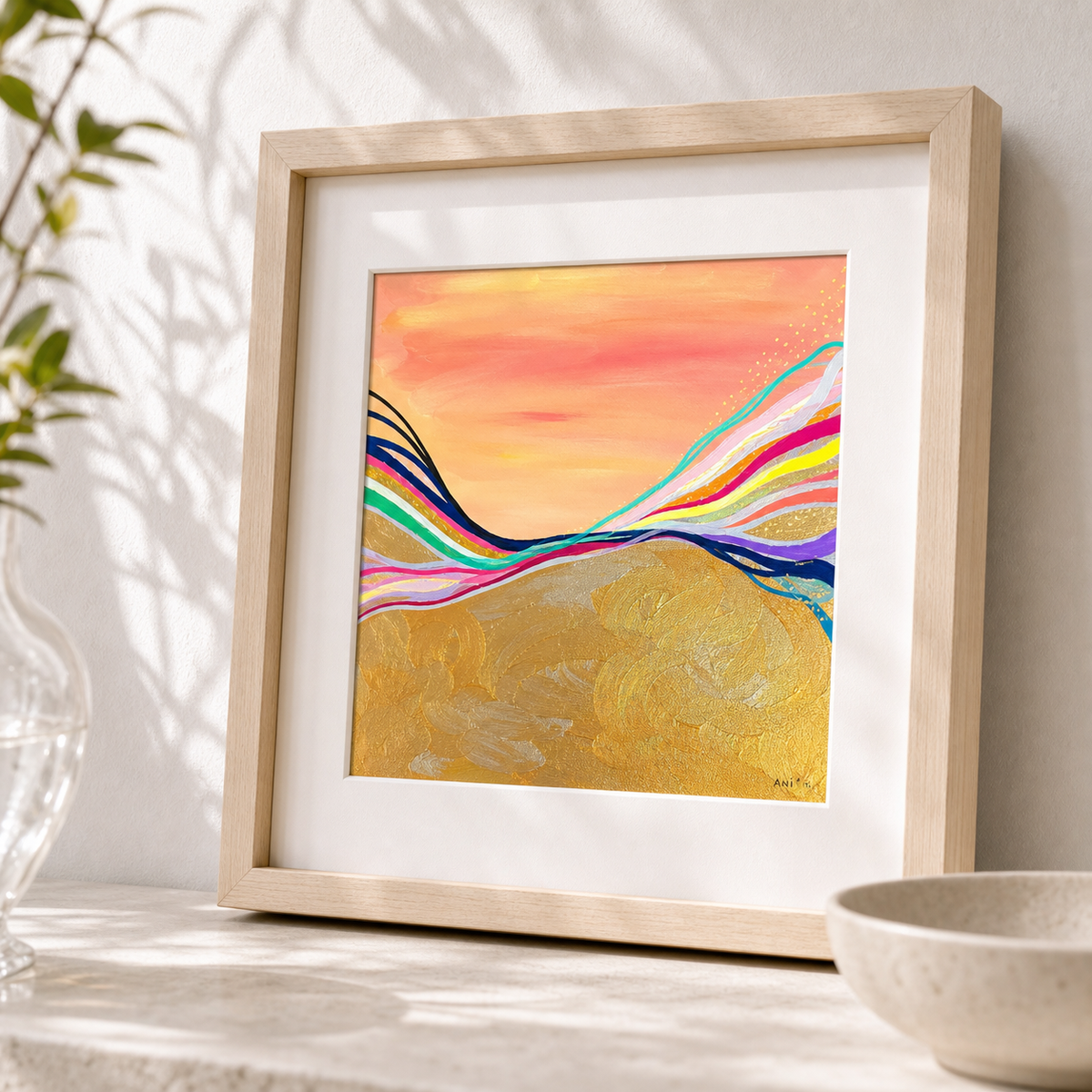 Pink Electric by Amber Miro, original sunset painting in coral, gold, and hot pink, angled view, matted in a wood frame