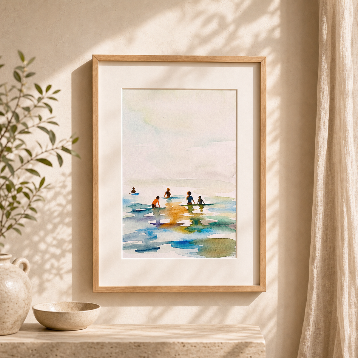 Summer Afternoon by Amber Miro, original watercolor in soft blush and blue, framed in oak beside a linen curtain