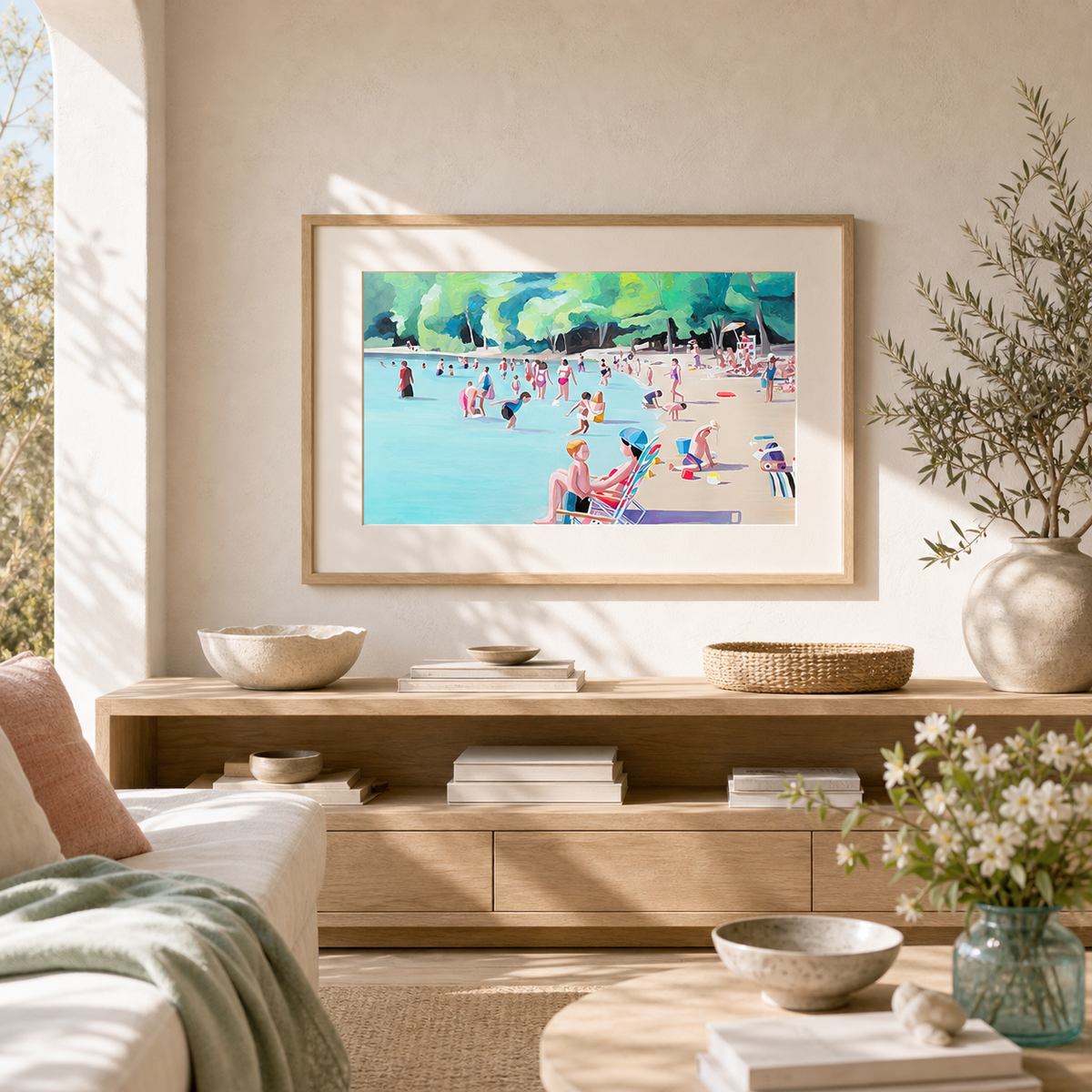 Walden by Amber Miro, original acrylic painting of swimmers at Walden Pond, framed above a wooden media console