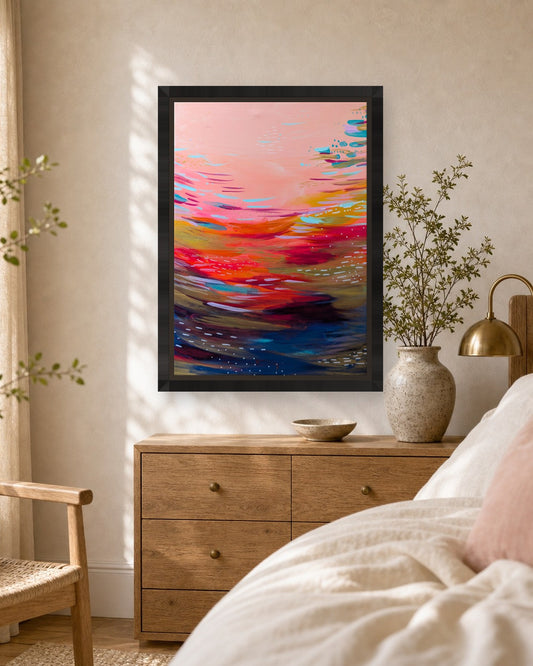 Sunsets at Sea by Amber Miro, framed canvas print in a black floater frame